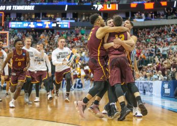 DALLAS, TX - MARCH 17: Loyola-Chicago Ramblers players celebrate winning the NCAA Div I Men's Championship Second Round basketball game between Loyola-Chicago and Tennessee on March 17, 2018 at American Airlines Center in Dallas, TX. (Photo by George Walker/Icon Sportswire)
