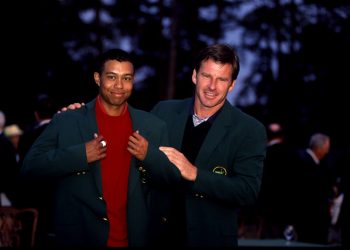 13 Apr 1997:  Tiger Woods, left, is presened the Green Jacket by previous winner Nick Faldo, right, after Woods won the Masters Tournament at the Augusta National Golf Course in Augusta, Georgia.
Mandatory Credit:  John Biever/Icon SMI