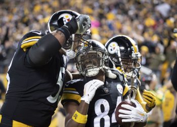 PITTSBURGH, PA - DECEMBER 02:  Pittsburgh Steelers wide receiver Antonio Brown (84) smiles with team mate  Maurkice Pouncey (53) after scoring a touchdown at the end of the second quarter during a NFL football game between the Pittsburgh Steelers and Los Angeles Chargers at Heinz Field on December 2, 2018 in Pittsburgh, PA. (Photo by Shelley Lipton/Icon Sportswire)