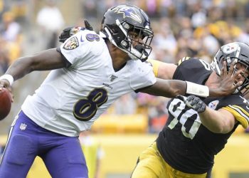 PITTSBURGH, PA - OCTOBER 06: Baltimore Ravens quarterback Lamar Jackson (8) stiff-arms Pittsburgh Steelers outside linebacker T.J. Watt (90) during the game between the Pittsburgh Steelers and the Baltimore Ravens on October 6, 2019 at Heinz Field in Pittsburgh, PA. (Photo by Shelley Lipton/Icon Sportswire)