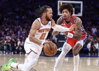 Apr 20, 2024; New York, New York, USA; New York Knicks guard Jalen Brunson (11) drives past Philadelphia 76ers guard Kelly Oubre Jr. (9) in the third quarter in game one of the first round for the 2024 NBA playoffs at Madison Square Garden. Mandatory Credit: Wendell Cruz-USA TODAY Sports