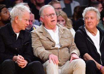Mar 4, 2024; Los Angeles, California, USA; Former tennis player John McEnroe Warner Bros. Discovery chief executive David Zaslav and actor Dustin Hoffman attend the game between the Los Angeles Lakers and Oklahoma City Thunder at Crypto.com Arena. Mandatory Credit: Gary A. Vasquez-USA TODAY Sports