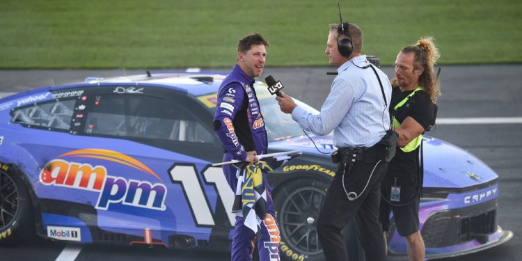 LAS VEGAS, NV - OCTOBER 12: Denny Hamlin (#11 Joe Gibbs Racing ampm Toyota) is emotional while being interviewed after winning the race during the NASCAR Cup Series South Point 400 on October 12, 2025, at Las Vegas Motor Speedway in Las Vegas, NV. (Photo by Chris Williams/LVMS/Icon Sportswire)