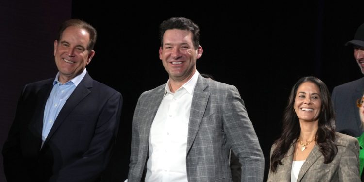 Feb 6, 2024; Las Vegas, NV, USA; CBS Sports play-by-play announcer Jim Nantz (left), analyst Tony Romo (center) and sideline reporter Tracy Wolfson at press conference at the Super Bowl 58 Media Center at the Mandalay Bay Resort and Casino.  Mandatory Credit: Kirby Lee-USA TODAY Sports