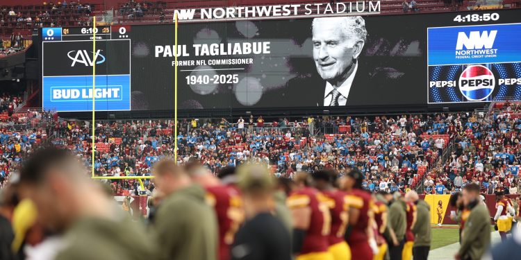 Nov 9, 2025; Landover, Maryland, USA; A tribute to former NFL commissioner Paul Tagliabue is seen on the video board prior to a game between the Washington Commanders and the Detroit Lions at Northwest Stadium. Mandatory Credit: Geoff Burke-Imagn Images