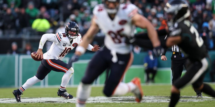 Nov 28, 2025; Philadelphia, Pennsylvania, USA; Chicago Bears quarterback Caleb Williams (18) scrambles with the ball against the Philadelphia Eagles during the second quarter of the game at Lincoln Financial Field. Mandatory Credit: Bill Streicher-Imagn Images