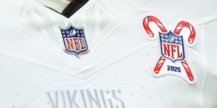 Dec 25, 2025; Minneapolis, Minnesota, USA; The Christmas Day patch is seen on the jersey of Minnesota Vikings running back Zavier Scott (36) during warmups before the game against the Detroit Lions at U.S. Bank Stadium. Mandatory Credit: Matt Krohn-Imagn Images