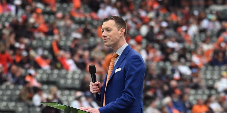 3CCJ45X August 11, 2023: Baltimore Orioles broadcaster Kevin Brown emcees pregame activities during the team's home opener at Oriole Park at Camden Yards on April 7, 2023, in Baltimore. (Credit Image: © Kenneth K. Lam/Baltimore Sun via ZUMA Press Wire)