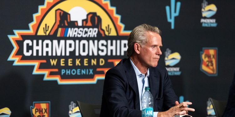 Oct 31, 2025; Avondale, Arizona, USA; NASCAR commissioner Steve Phelps speaks to the media during the state of the sport press conference in the media center at Phoenix Raceway. Mandatory Credit: Mark J. Rebilas-Imagn Images