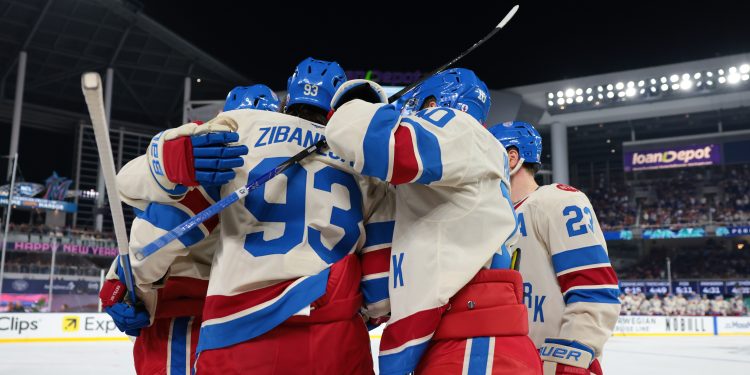 Jan 2, 2026; Miami, Florida, USA; New York Rangers center Mika Zibanejad (93) celebrates with teammates after scoring a goal against the Florida Panthers during the first period in the 2026 Winter Classic ice hockey game at loanDepot Park. Mandatory Credit: Sam Navarro-Imagn Images