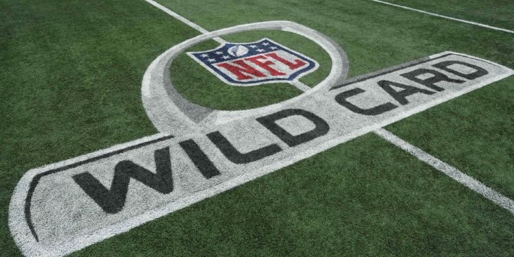 Jan 10, 2026; Charlotte, NC, USA; The NFL Wild Card logo on the field prior to the 2026 NFC wild card playoff football game between the Los Angeles Rams and the Carolina Panthers at Bank of America Stadium. Mandatory Credit: Bob Donnan-Imagn Images
