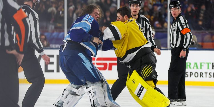 Feb 1, 2026; Tampa Bay, Florida, USA; Tampa Bay Lightning goaltender Andrei Vasilevskiy (88) and Boston Bruins goaltender Jeremy Swayman (1) fight during the second period in the 2026 Stadium Series ice hockey game at Raymond James Stadium. Mandatory Credit: Kim Klement Neitzel-Imagn Images
