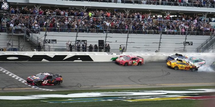 Tyler Reddick reaches the finish line with a multiple car accident right behind him. The 2026 Daytona 500 held Feb.15 at Daytona International Speedway. © Tim Shortt/ News-Journal / USA TODAY NETWORK via Imagn Images