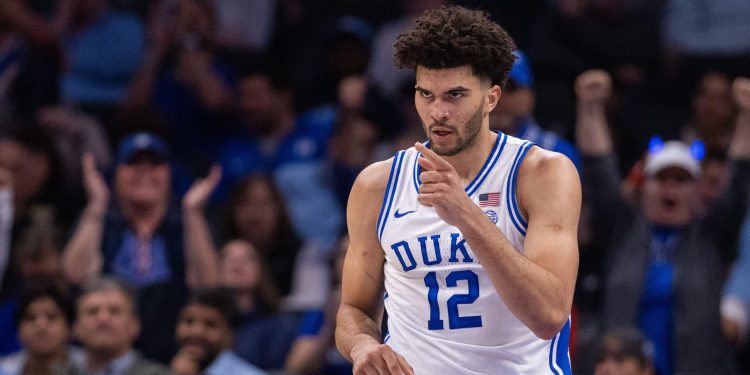 3E0KJEX Charlotte, NC, USA. 12th Mar, 2026. Duke Blue Devils forward Cameron Boozer (12) celebrates against the Florida State Seminoles in the first half of the 2026 ACC Men's Basketball Championship at Spectrum Center in Charlotte, NC. (Scott Kinser/CSM) (Credit Image: © Scott Kinser/Cal Sport Media). Credit: csm/Alamy Live News