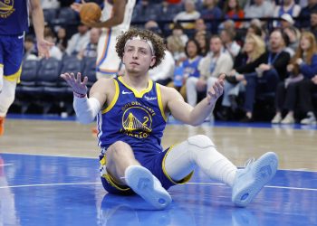 Mar 7, 2026; Oklahoma City, Oklahoma, USA; Golden State Warriors guard Brandin Podziemski (2) reacts after a play against the Oklahoma City Thunder during the second half at Paycom Center. Mandatory Credit: Alonzo Adams-Imagn Images