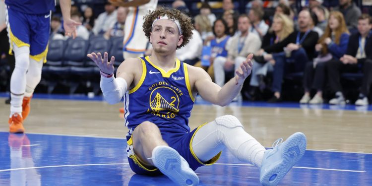 Mar 7, 2026; Oklahoma City, Oklahoma, USA; Golden State Warriors guard Brandin Podziemski (2) reacts after a play against the Oklahoma City Thunder during the second half at Paycom Center. Mandatory Credit: Alonzo Adams-Imagn Images