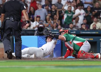 Mar 9, 2026; Houston, TX, United States; United States infielder Brice Turang (13) attempts to slide home in the second inning against Mexico at Daikin Park. Mandatory Credit: Troy Taormina-Imagn Images
