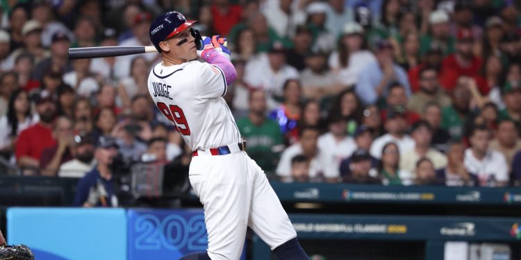 Mar 9, 2026; Houston, TX, United States; United States outfielder Aaron Judge (99) hits a two run home run in the third inning against Mexico at Daikin Park. Mandatory Credit: Troy Taormina-Imagn Images