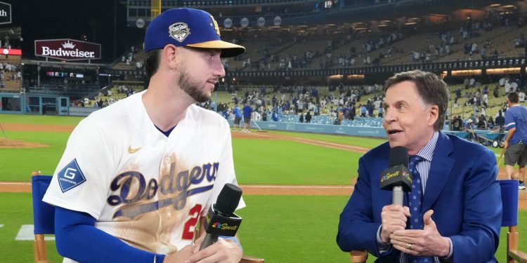 Mar 26, 2026; Los Angeles, California, USA; NBC Sports broadcaster Bob Costas (right) interviews Los Angeles Dodgers right fielder Kyle Tucker (23) after the game against the Arizona Diamondbacks at Dodger Stadium. Mandatory Credit: Kirby Lee-Imagn Images