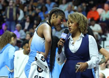 UNCASVILLE, CT - JUNE 15: CBS Sports sideline reporter Tiffany Blackmon speaks with Chicago Sky forward Angel Reese (5) during the WNBA Commissioners Cup game between Chicago Sky and Connecticut Sun on June 15, 2025, at Mohegan Sun Arena in Uncasville CT. (Photo by M. Anthony Nesmith/Icon Sportswire)