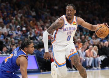 Oklahoma City Thunder guard Jalen Williams (8) drives against New York Knicks guard Miles McBride (2) during the second half of an NBA basketball game Sunday, March 29, 2026, in Oklahoma City. (AP Photo/Nate Billings)