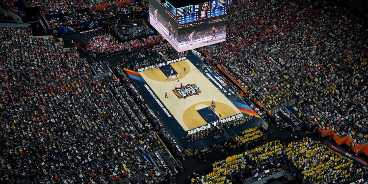 Arizona and Michigan compete during the first half of an NCAA college basketball tournament semifinal game at the Final Four, Saturday, April 4, 2026, in Indianapolis. (AP Photo/AJ Mast)