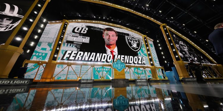 Indiana quarterback Fernando Mendoza is shown on a screen after being chosen by the Las Vegas Raiders with the first overall pick during the first round of the NFL football draft in Pittsburgh, Thursday, April 23, 2026. (Adam Hunger/AP Content Services for the NFL)