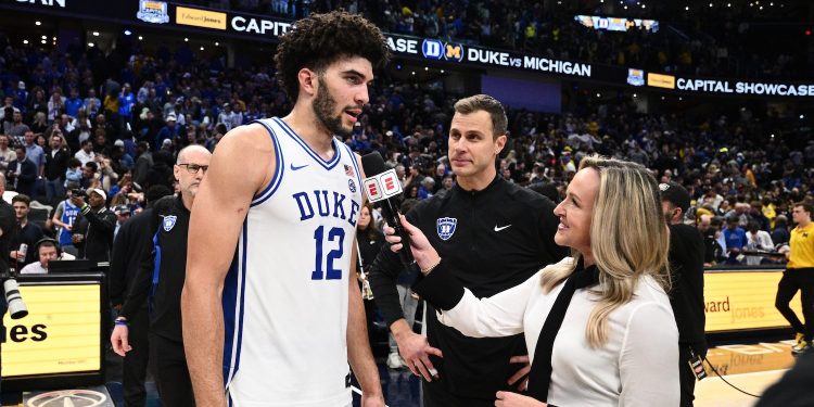 Washington, DC - February 21, 2026 - Capital One Arena: Cameron Boozer (12) and head coach Jon Scheyer of the Duke University Blue Devils with Kris Budden after winning the 2026 Edward Jones Capital Showcase.
(Photo by Nick Wass / ESPN Images)