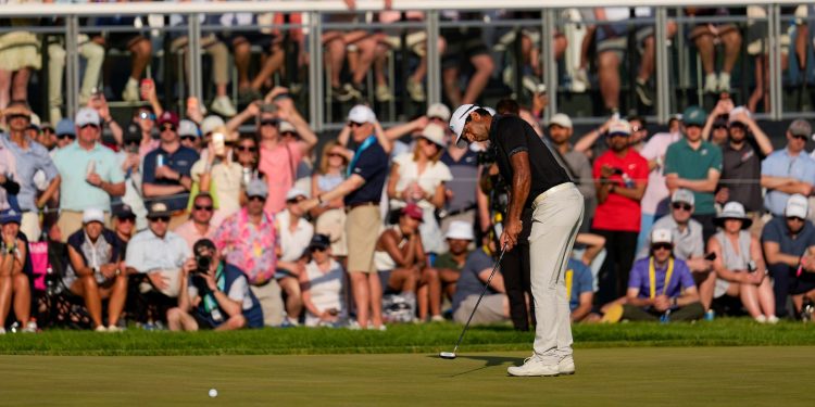 Aaron Rai, of England, putts on the 17th green during the final round of the PGA Championship golf tournament at Aronimink Golf Club, Sunday, May 17, 2026, in Newtown Square, PA. (AP Photo/Carolyn Kaster)