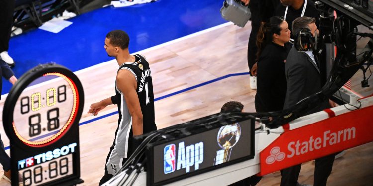 3ENDCY1 New York, USA. 10th June, 2026. Victor Wembanyama (1st L) of San Antonio Spurs leaves the court after the final game 4 between New York Knicks and San Antonio Spurs at the 2025-2026 NBA basketball game in San Antonio, the United States, June 10, 2026. Credit: Wu Xiaoling/Xinhua/Alamy Live News