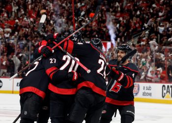 Carolina Hurricanes players celebrate after a goal by Andrei Svechnikov during the second period in Game 5 of the NHL hockey Stanley Cup Final series against the Vegas Golden Knights in Raleigh, N.C., Thursday, June 11, 2026. (AP Photo/Karl DeBlaker)
