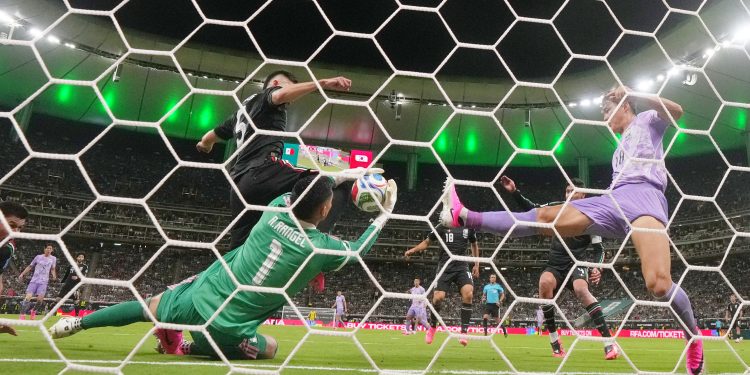 Mexico goalkeeper Raul Rangel (1) makes a save on the goal line during the World Cup Group A soccer match between Mexico and South Korea in Zapopan, near Guadalajara, Mexico, Thursday, June 18, 2026. (AP Photo/Fernando Llano)