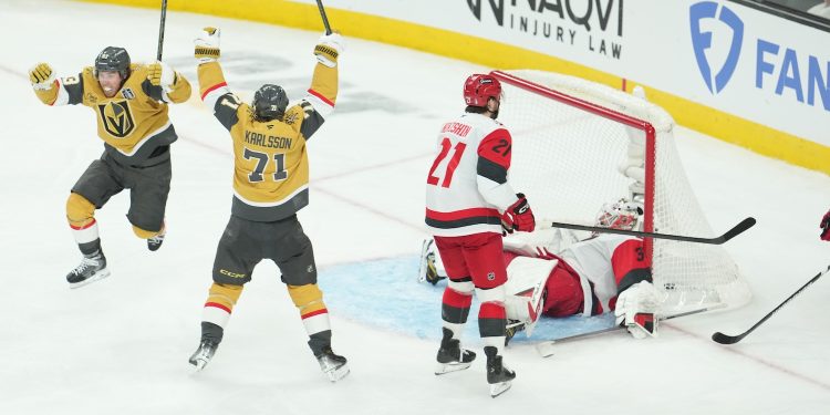 Las Vegas, NV - June 6, 2026 - T-Mobile Arena: Mitch Marner (93), William Karlsson (71) of the Vegas Golden Knights and Alexander Nikishin (21), Brandon Bussi (32) of the Carolina Hurricanes during game three of the 2026 Stanley Cup Final.
(Photo by Al Powers / ESPN Images)
