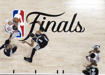 San Antonio, TX - June 3, 2026 - Frost Bank Center: Jalen Brunson (11), OG Anunoby (8) of the New York Knicks and Keldon Johnson (3), Victor Wembanyama (1), Devin Vassell (24) of the San Antonio Spurs during game one of the 2026 NBA Finals.
(Photo by Ben Solomon / ESPN Images)