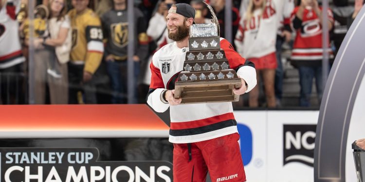 Las Vegas, NV - June 14, 2026 - T-Mobile Arena: Jordan Staal (11) of the Carolina Hurricanes holding the Conn Smythe Trophy after winning game six and the 2026 Stanley Cup Final.
(Photo by Phil Ellsworth / ESPN Images)