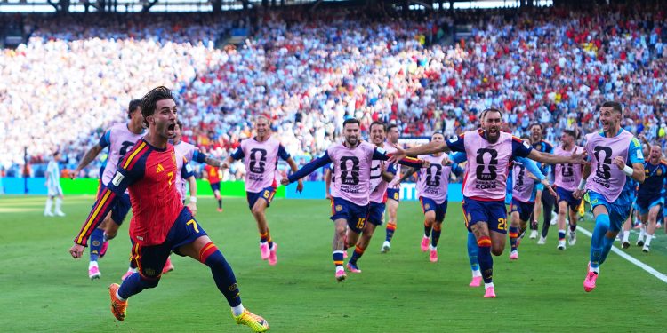 Spain's Ferran Torres (7) celebrates scoring their first goal during the World Cup final soccer match between Spain and Argentina in East Rutherford, N.J., near New York, Sunday, July 19, 2026. (AP Photo/Julio Cortez)