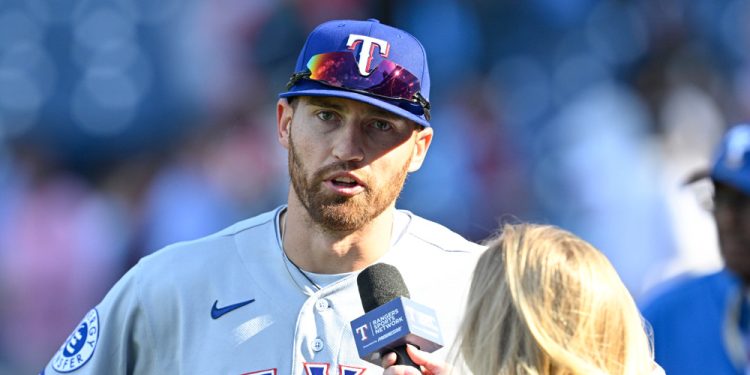 PHILADELPHIA, PA - MARCH 29: Texas Rangers left fielder Brandon Nimmo #24 is interviewed after the game between the Philadelphia Phillies and the Texas Rangers on March 29th, 2026 at Citizens Bank Park in Philadelphia, PA. (Photo by Terence Lewis/Icon Sportswire)