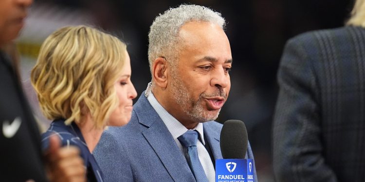 Charlotte Hornets television sideline reporter Shannon Spake and color analyst Dell Curry in the first half of an NBA basketball game Sunday, Jan. 18, 2026, in Denver. (AP Photo/David Zalubowski)
