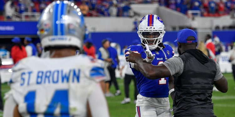 Buffalo Bills cornerback Maxwell Hairston, right, and Detroit Lions wide receiver Amon-Ra St. Brown exchange words after an NFL football game in Orchard Park, N.Y., Thursday, Sept. 17, 2026. (AP Photo/Adrian Kraus)