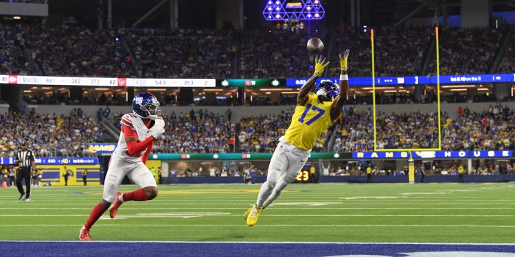Los Angeles Rams wide receiver Davante Adams (17) makes a touchdown catch past New York Giants cornerback Colton Hood (12) during the second half of an NFL football game in Inglewood, Calif., Monday, Sept. 21, 2026. (AP Photo/Katie Chin)