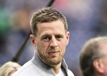 FILE - Former Houston Texans players J.J. Watt stands on the sidelines prior to an NFL football game between the Pittsburgh Steelers and the Houston Texans, Oct. 1, 2023 in Houston. (AP Photo/Maria Lysaker, file)