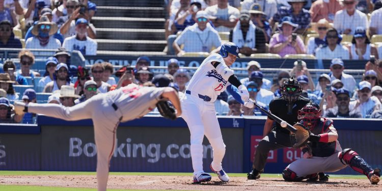 Los Angeles Dodgers' Shohei Ohtani hits a single during the first inning of Game 1 of a National League Division Series baseball game against the Atlanta Braves Saturday, Oct. 3, 2026, in Los Angeles. (AP Photo/Jae C. Hong)