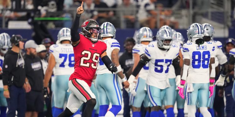 Tampa Bay Buccaneers safety Miles Killebrew (29) celebrates after the Buccaneers recovered a fumbled kickoff return by the Dallas Cowboys in the second half of an NFL football game in Arlington, Texas on Thursday, Oct. 8, 2026. (AP Photo/Julio Cortez)