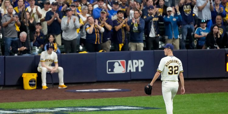 Milwaukee Brewers pitcher Jacob Misiorowski leaves the game during the fifth inning of Game 1 of baseball's National League Championship Series between the Milwaukee Brewers and the Los Angeles Dodgers, Sunday, Oct. 11, 2026, in Milwaukee. (AP Photo/Kyla Wolf)