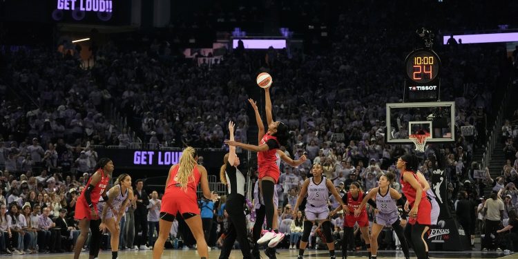 Fans at Chase Center watch the opening tip-off during the first half of Game 1 of the WNBA basketball finals between the Golden State Valkyries and the Atlanta Dream, Saturday, Oct. 17, 2026, in San Francisco. (AP Photo/Jeff Chiu)
