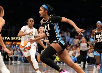 Atlanta Dream forward Angel Reese (5) dribbles during the second half of Game 3 of the WNBA basketball finals against the Golden State Valkyries on Wednesday, Oct. 21, 2026, in Atlanta. (AP Photo/Brynn Anderson)