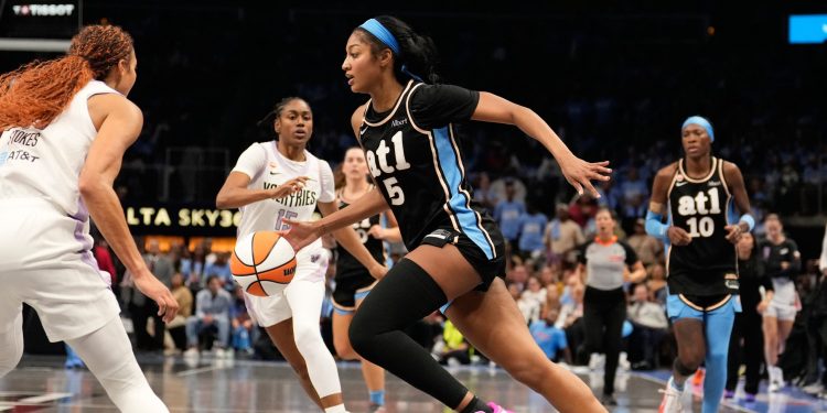Atlanta Dream forward Angel Reese (5) dribbles during the second half of Game 3 of the WNBA basketball finals against the Golden State Valkyries on Wednesday, Oct. 21, 2026, in Atlanta. (AP Photo/Brynn Anderson)